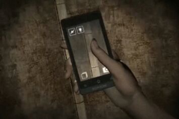Screenshot der Hand einer Game Figur mit Smartphone