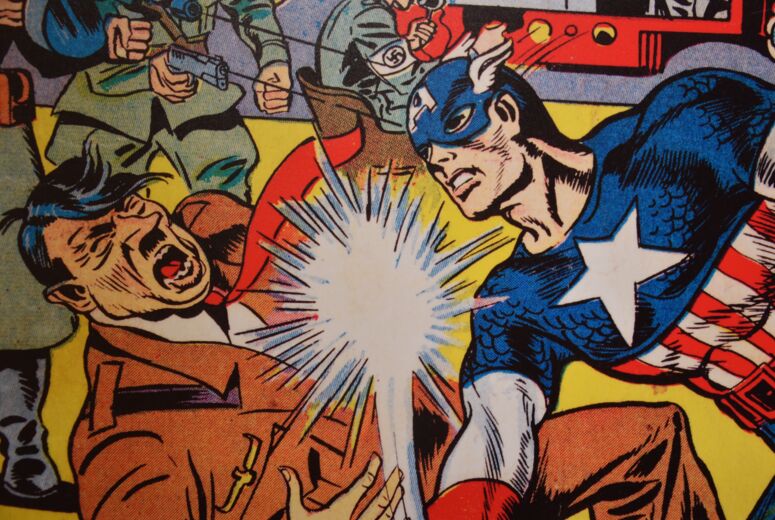 Der Superheld Captain America schlägt Adolf Hitler nieder